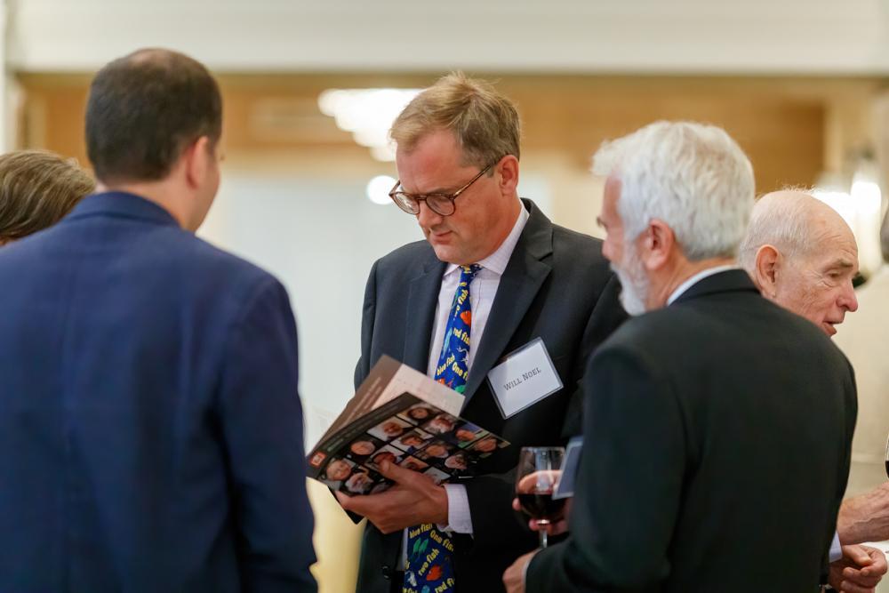 Photo of guests mingling from Friends of Princeton University Library Fall 2021 dinner